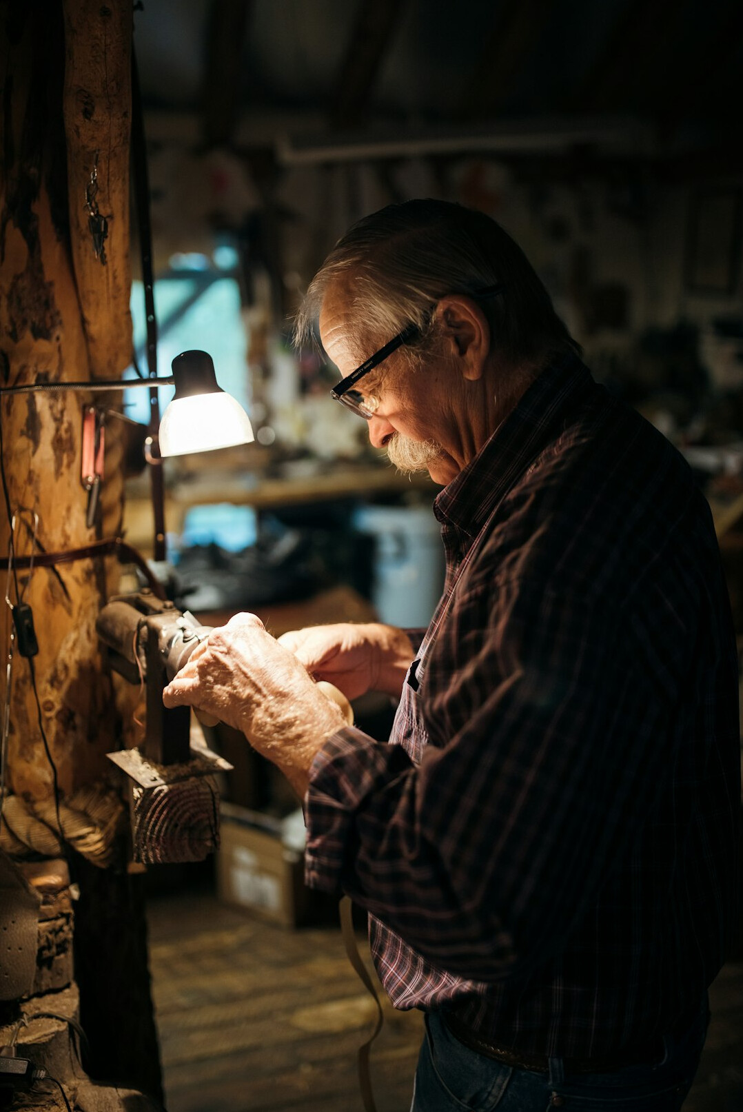 Danish craftsman woodworking in his workshop